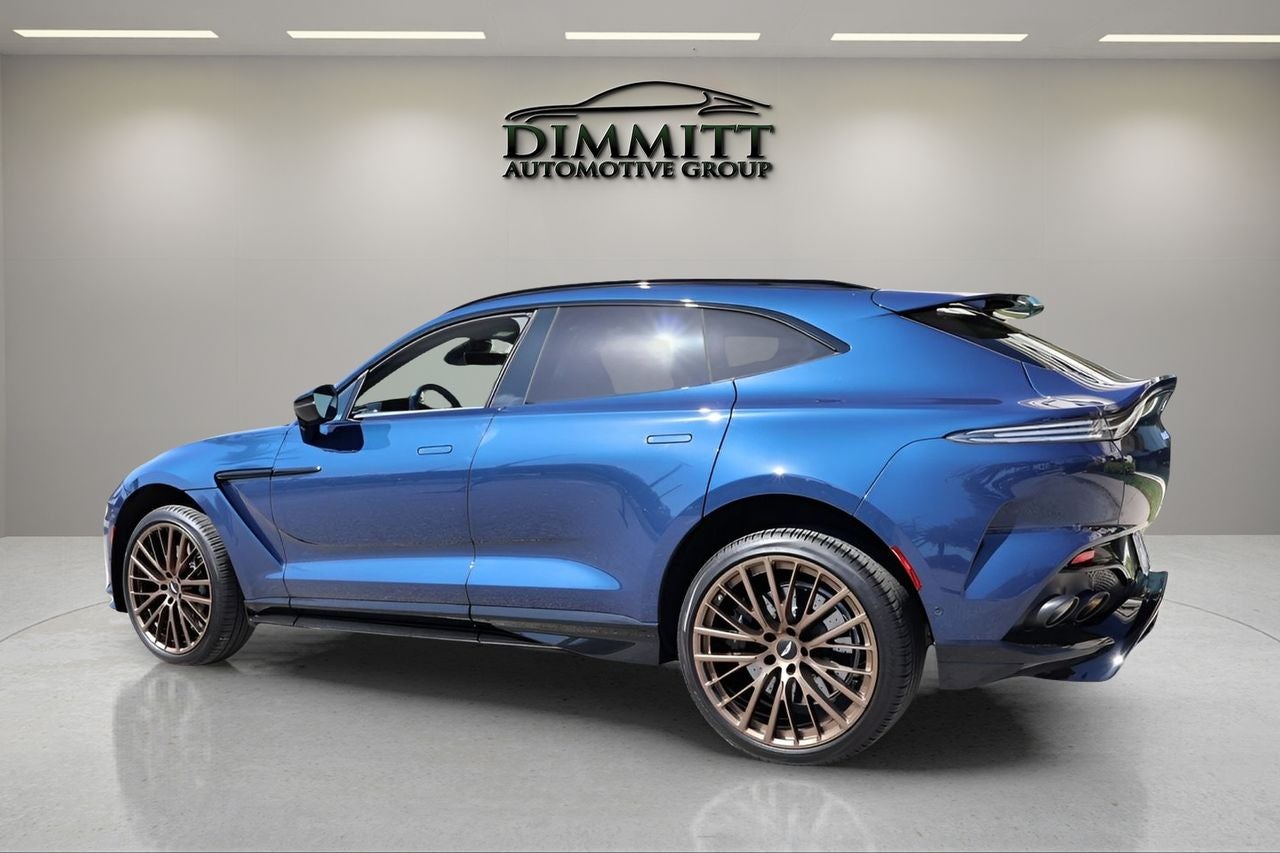 2025 Aston Martin DBX — rear three-quarter view