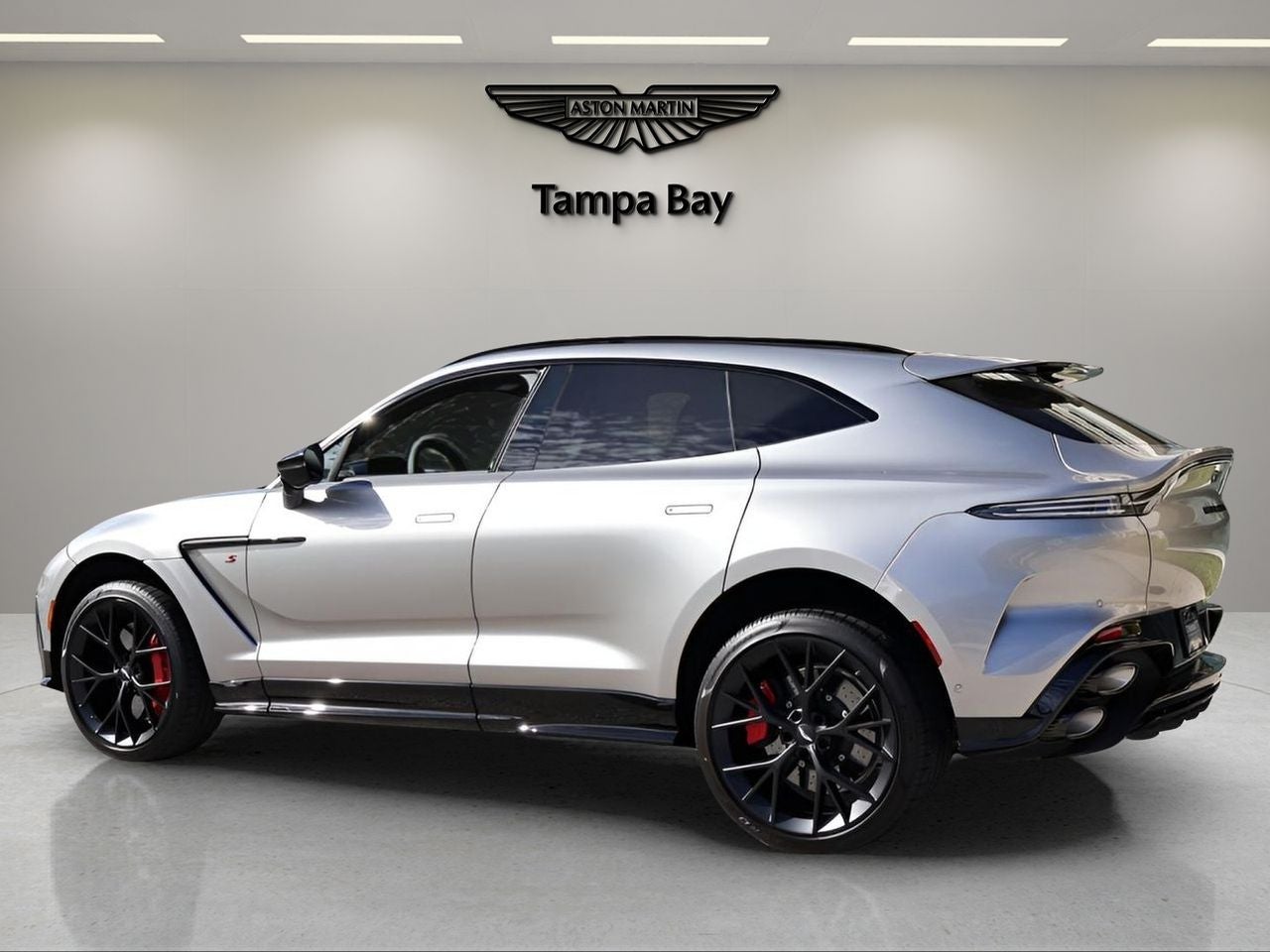 2026 Aston Martin DBX — rear three-quarter view